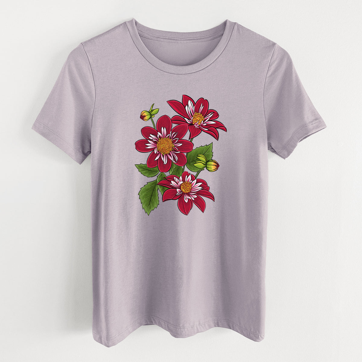Light violet women's relaxed fit cotton t-shirt laid flat, printed with a full-color illustration of deep red dahlia flowers with green leaves and a small bee.