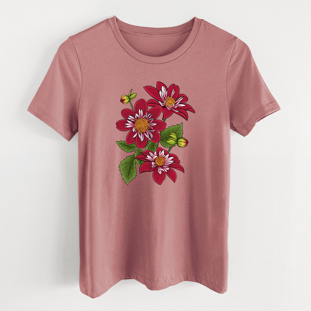 Mauve pink women's relaxed fit cotton t-shirt laid flat, printed with a full-color illustration of deep red dahlia flowers with green leaves and a small bee.