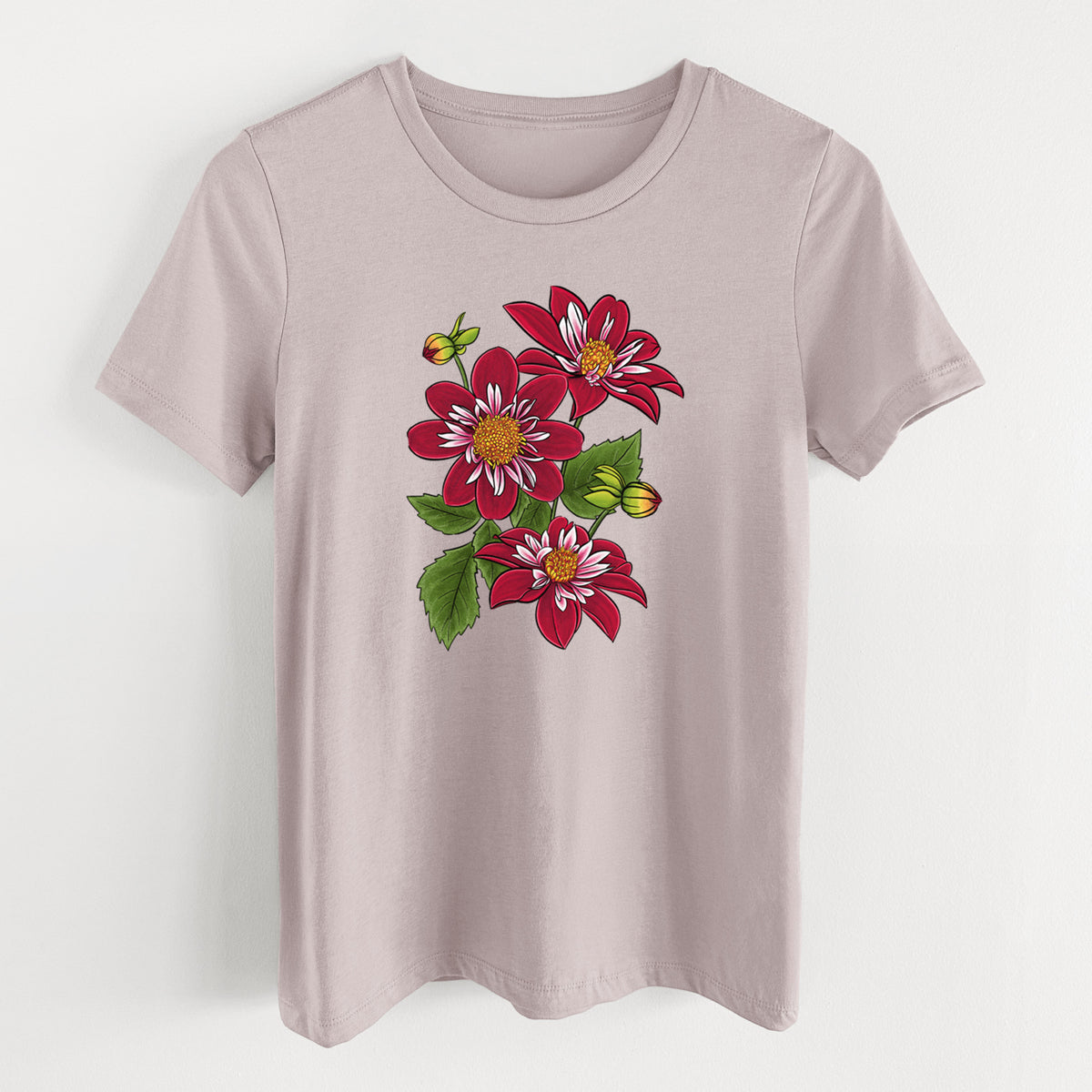Pink gravel women's relaxed fit cotton t-shirt laid flat, printed with a full-color illustration of deep red dahlia flowers with green leaves and a small bee.