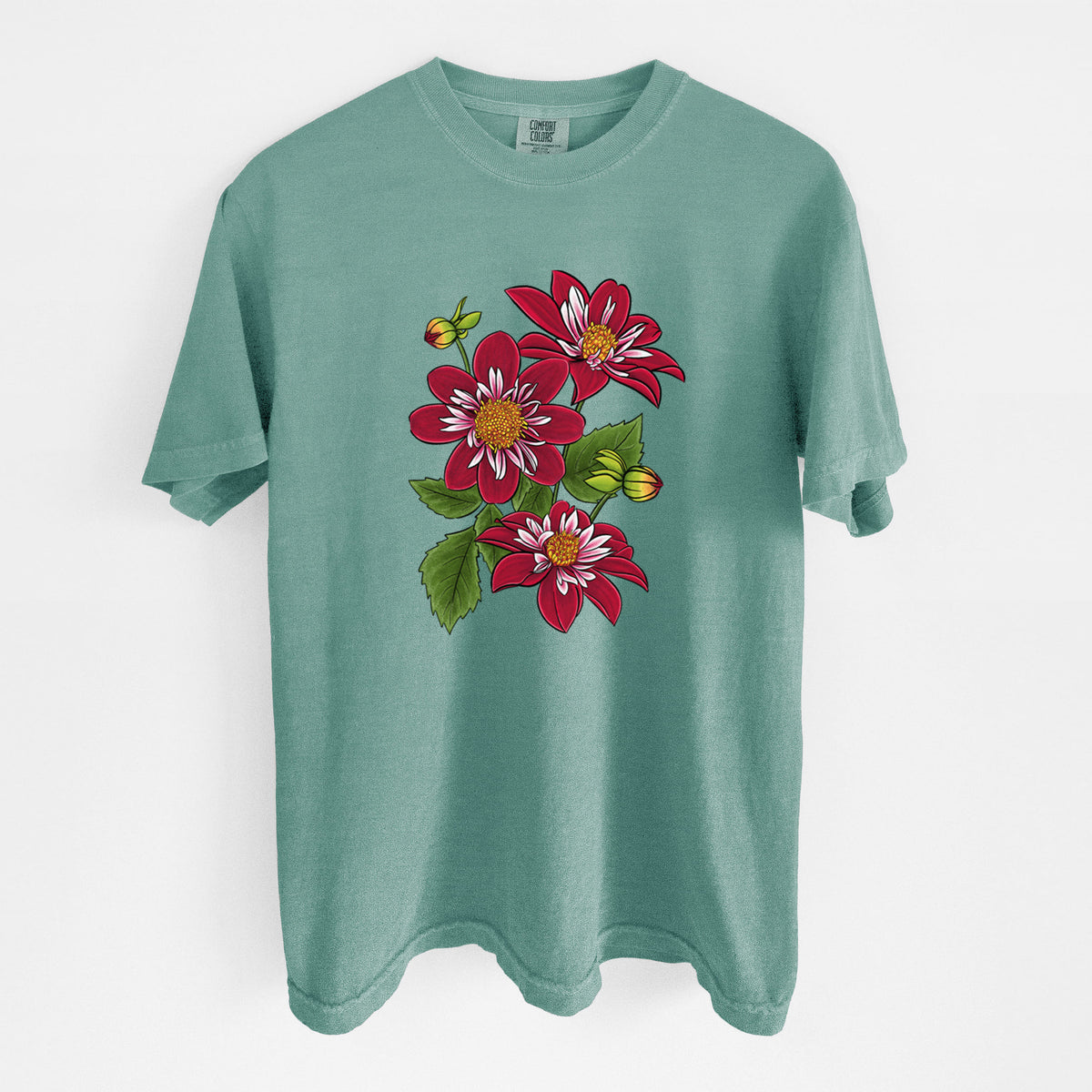 Reef green Comfort Colors t-shirt laid flat, printed with a full-color illustration of deep red dahlia flowers with green leaves and a small bee.