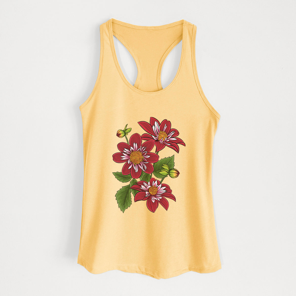 Banana cream women's racerback tank top laid flat, printed with a full-color illustration of deep red dahlia flowers with green leaves and a small bee.
