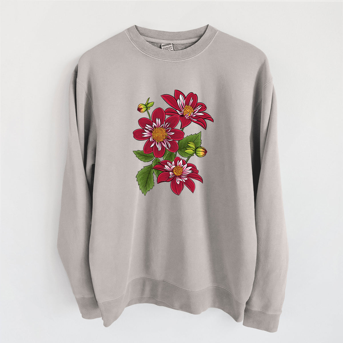 Cement grey pigment dyed crewneck sweatshirt laid flat, printed with a full-color illustration of deep red dahlia flowers with green leaves and a small bee.