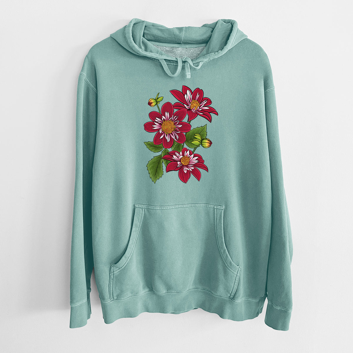 Mint green pigment dyed hoodie laid flat, printed with a full-color illustration of deep red dahlia flowers with green leaves and a small bee.