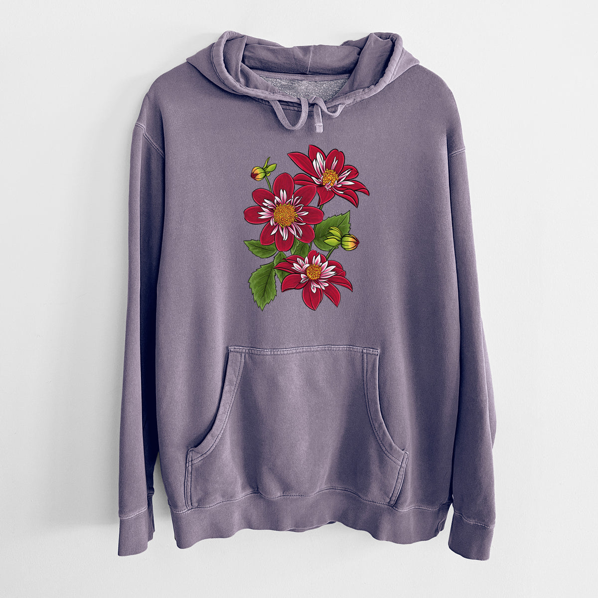 Plum purple pigment dyed hoodie laid flat, printed with a full-color illustration of deep red dahlia flowers with green leaves and a small bee.