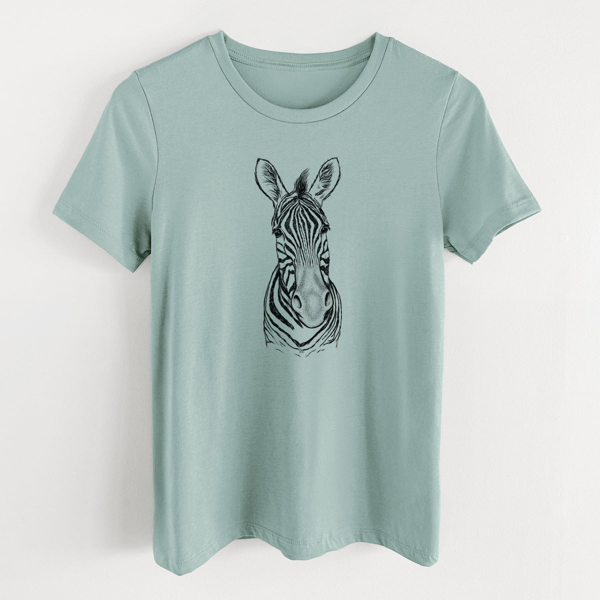 Dusty blue women's relaxed fit cotton t-shirt laid flat, printed with a detailed black ink portrait of a Damara zebra facing forward.