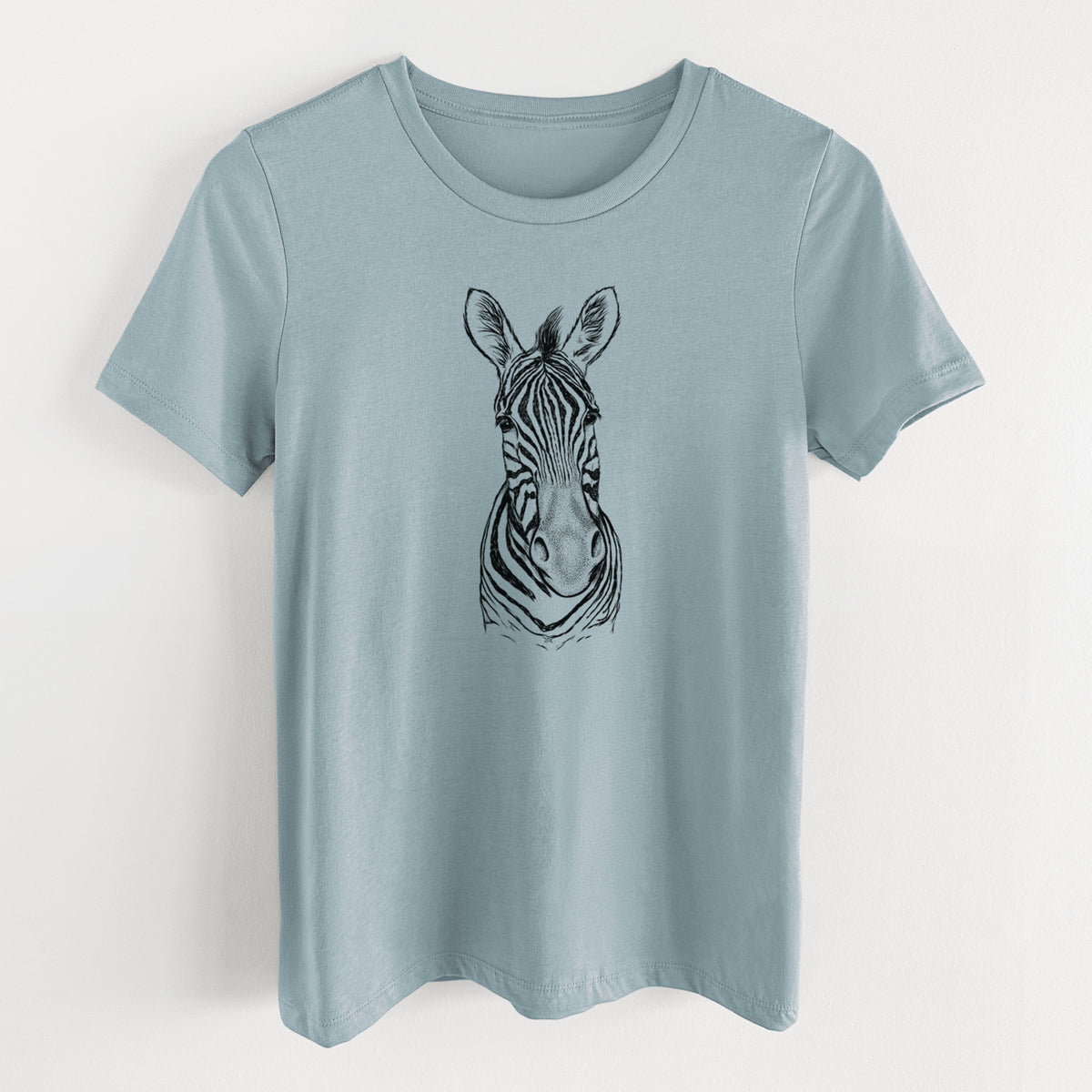 Vintage denim women's relaxed fit cotton t-shirt laid flat, printed with a detailed black ink portrait of a Damara zebra facing forward.