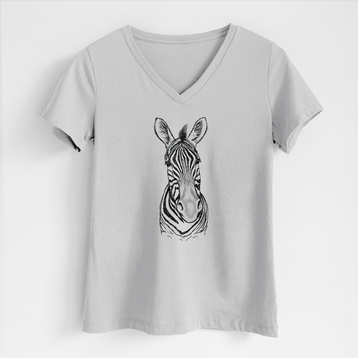 Lunar grey women's relaxed fit cotton V-neck t-shirt laid flat, printed with a detailed black ink portrait of a Damara zebra facing forward.