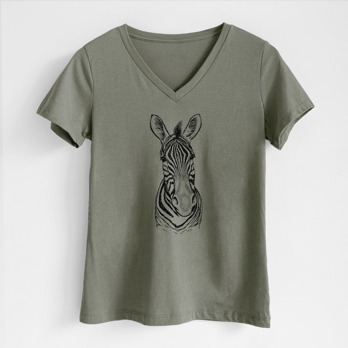 Military green women's relaxed fit cotton V-neck t-shirt laid flat, printed with a detailed black ink portrait of a Damara zebra facing forward.
