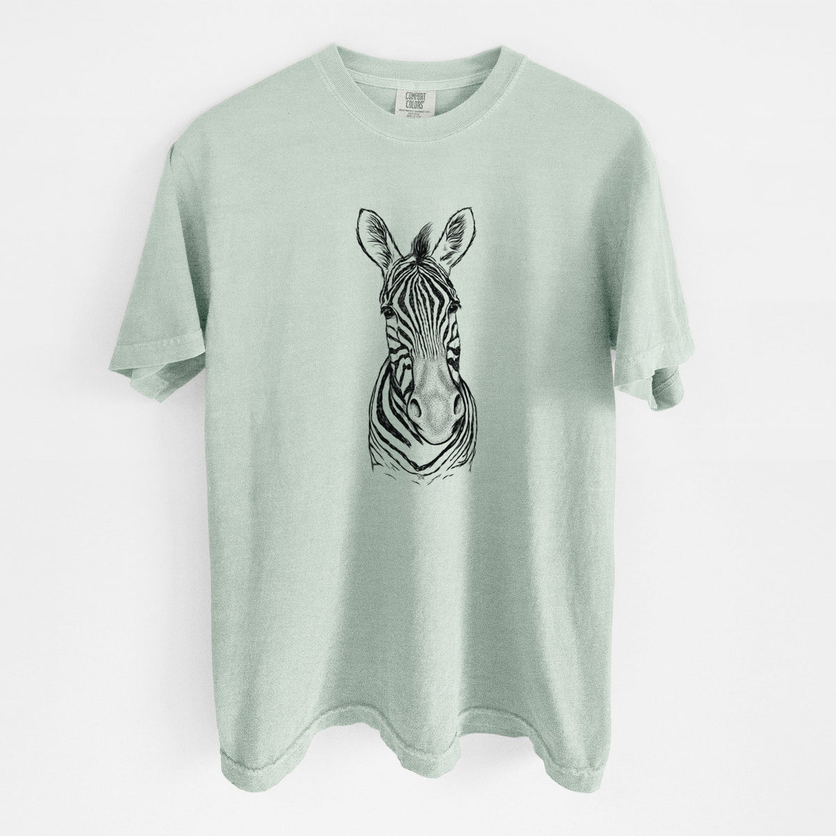 Bay green Comfort Colors t-shirt laid flat, printed with a detailed black ink portrait of a Damara zebra facing forward.