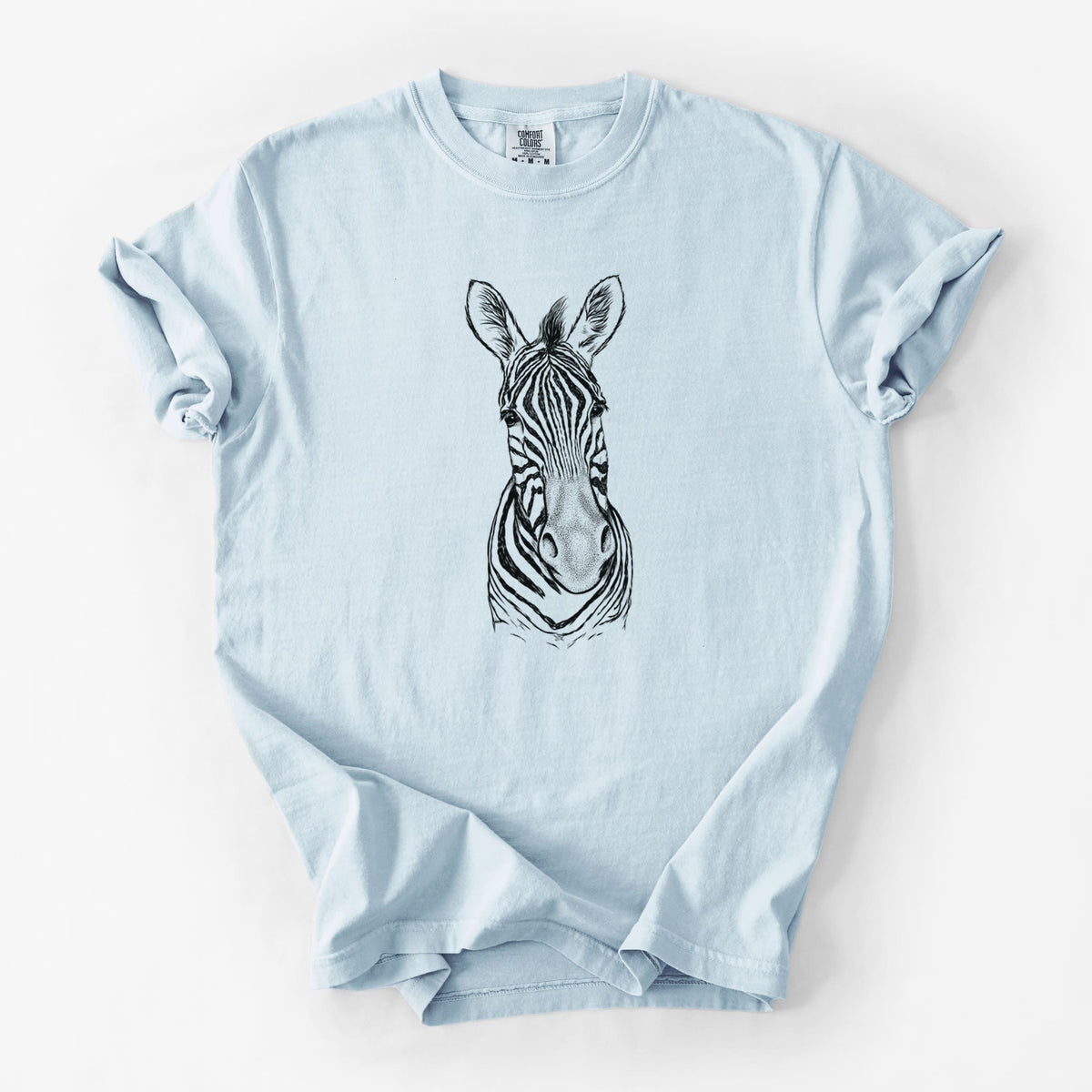 Chambray blue Comfort Colors t-shirt laid flat, printed with a detailed black ink portrait of a Damara zebra facing forward.