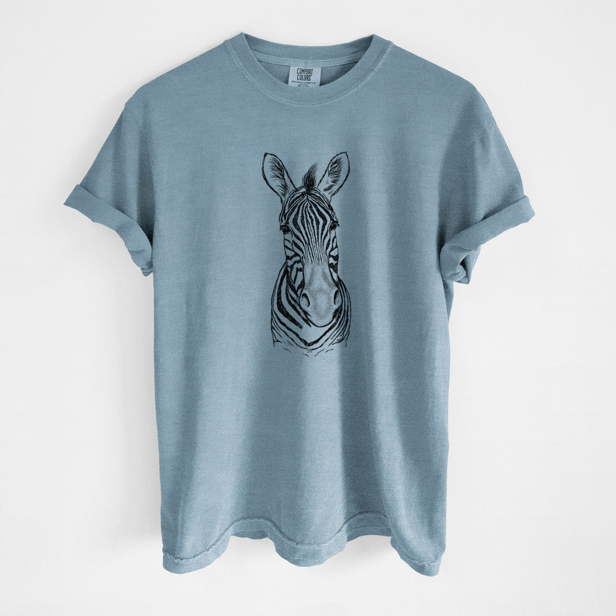 Steel blue Comfort Colors t-shirt laid flat, printed with a detailed black ink portrait of a Damara zebra facing forward.