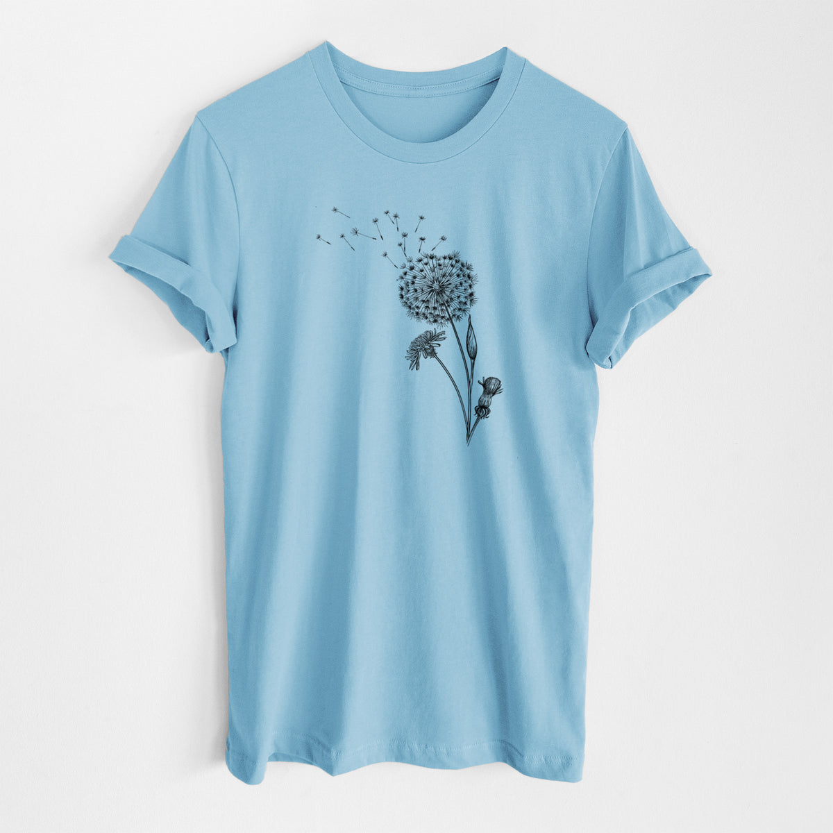 Ocean blue lightweight cotton t-shirt laid flat, printed with a black ink line drawing of a dandelion seed head with seeds blowing away.