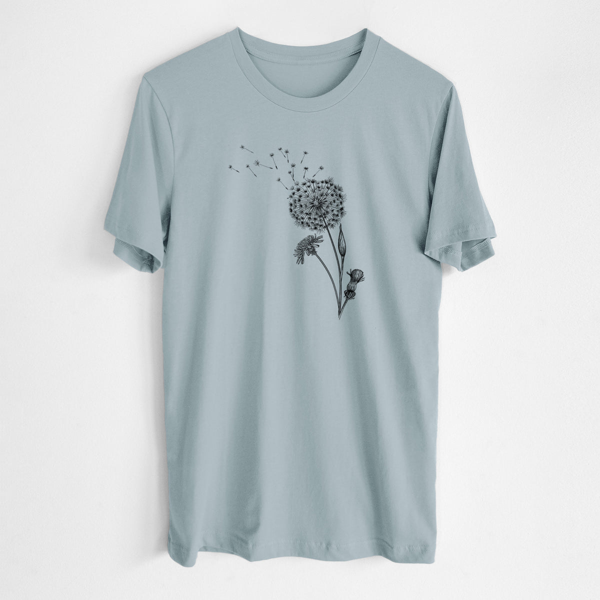 Vintage denim lightweight cotton t-shirt laid flat, printed with a black ink line drawing of a dandelion seed head with seeds blowing away.