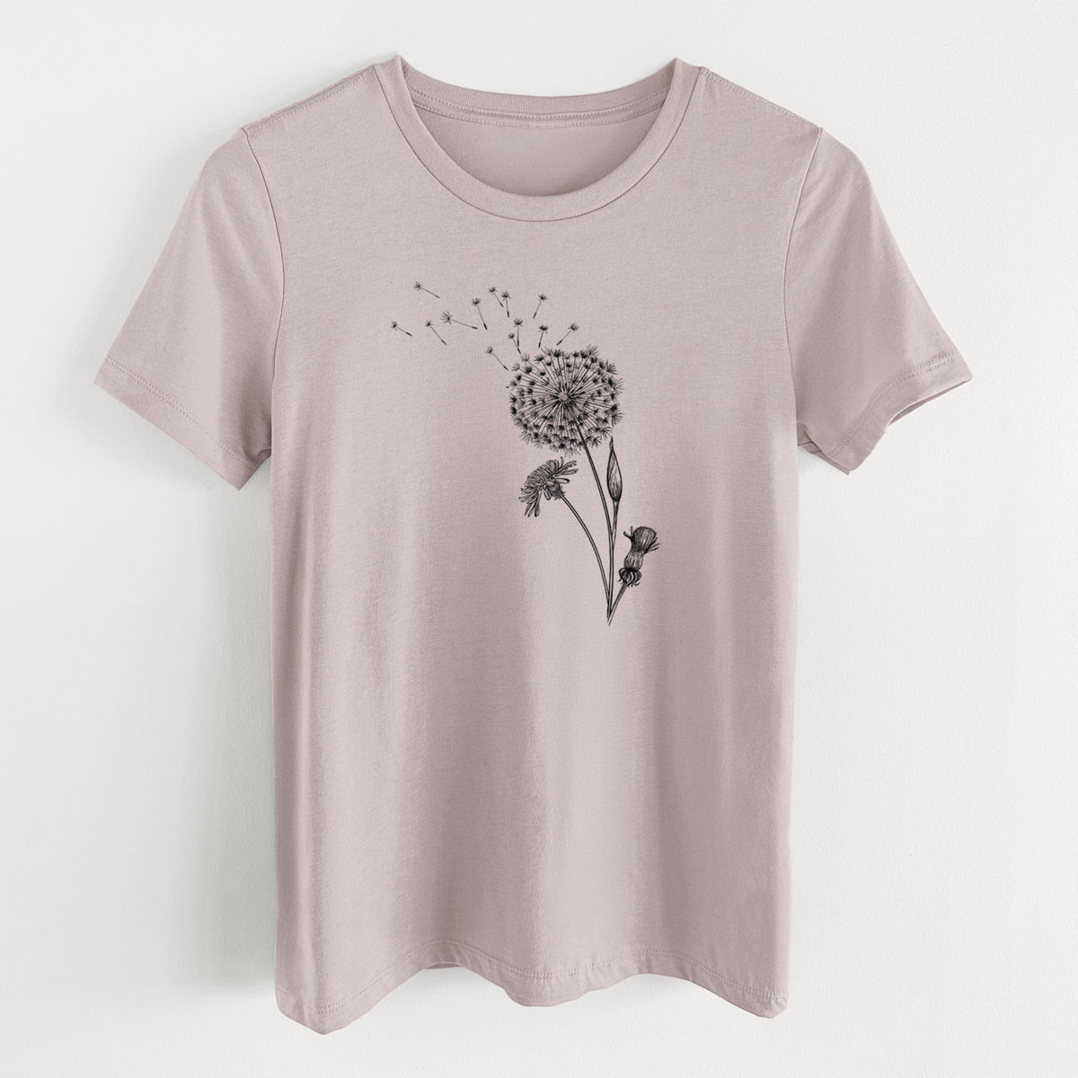 Pink gravel women's relaxed fit cotton t-shirt laid flat, printed with a black ink line drawing of a dandelion seed head with seeds blowing away.