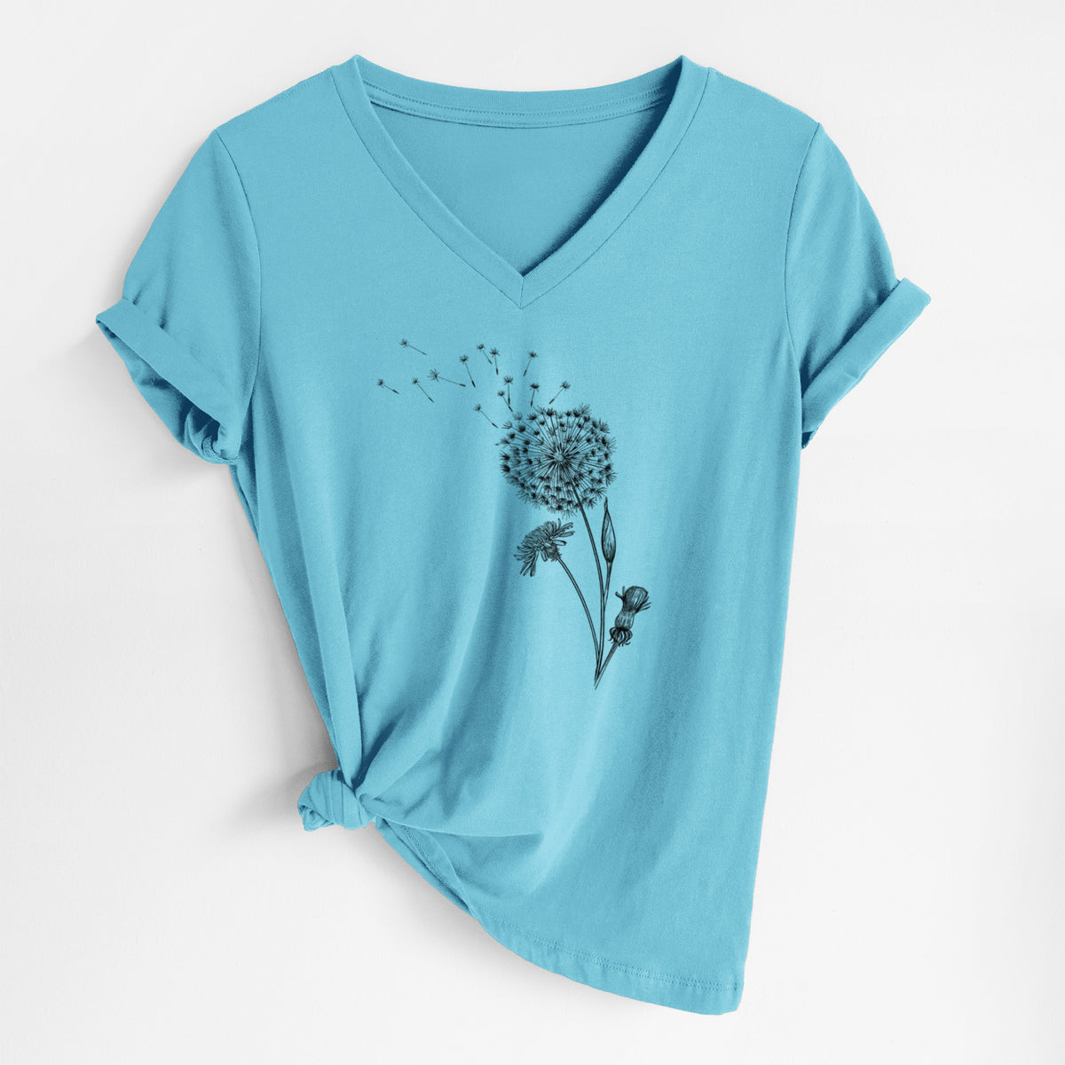 Turquoise women's relaxed fit cotton V-neck t-shirt laid flat, printed with a black ink line drawing of a dandelion seed head with seeds blowing away.