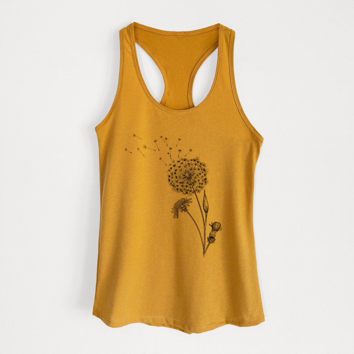 Gold women's racerback tank top laid flat, printed with a black ink line drawing of a dandelion seed head with seeds blowing away.