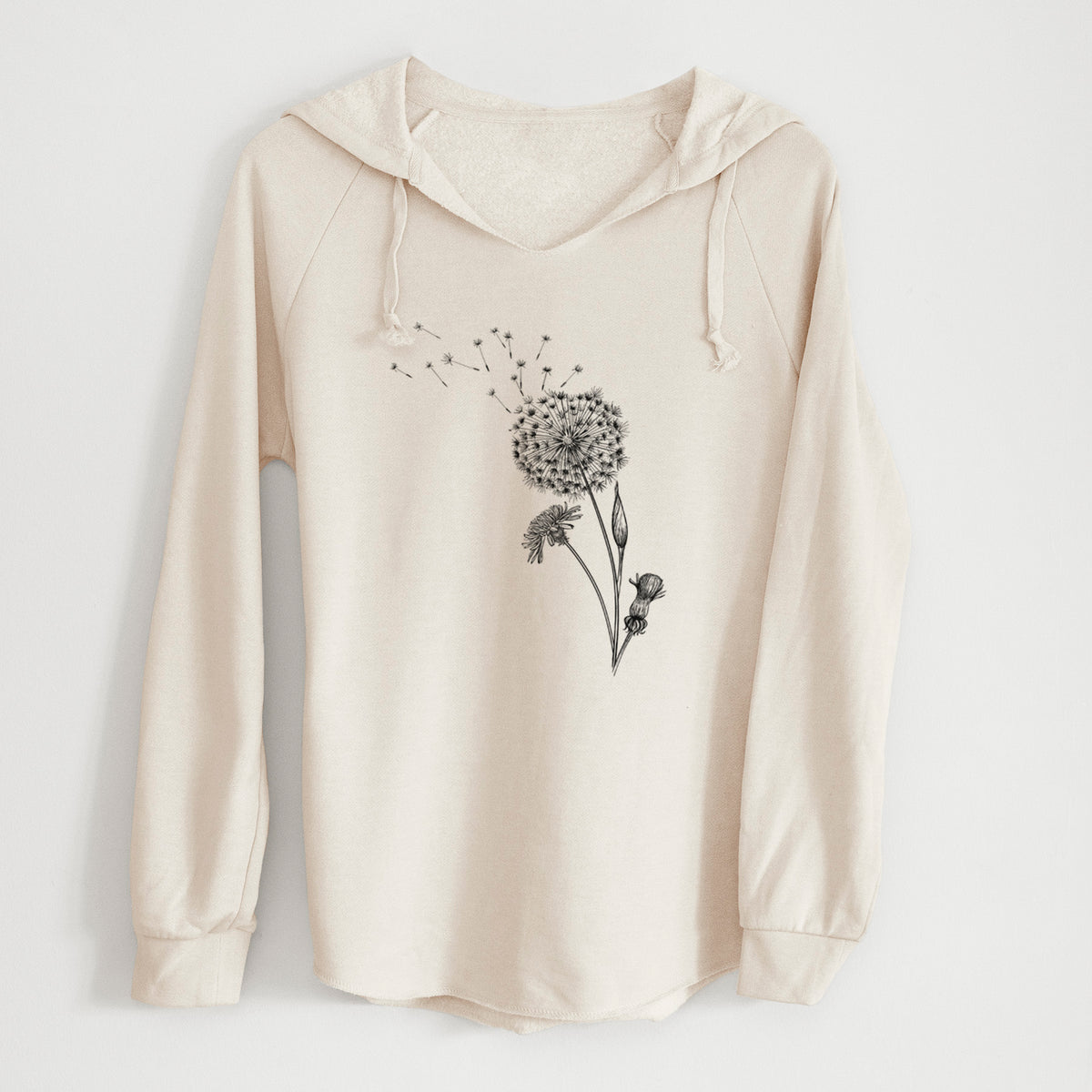 Bone cream women's Cali Wave hooded sweatshirt laid flat, printed with a black ink line drawing of a dandelion seed head with seeds blowing away.