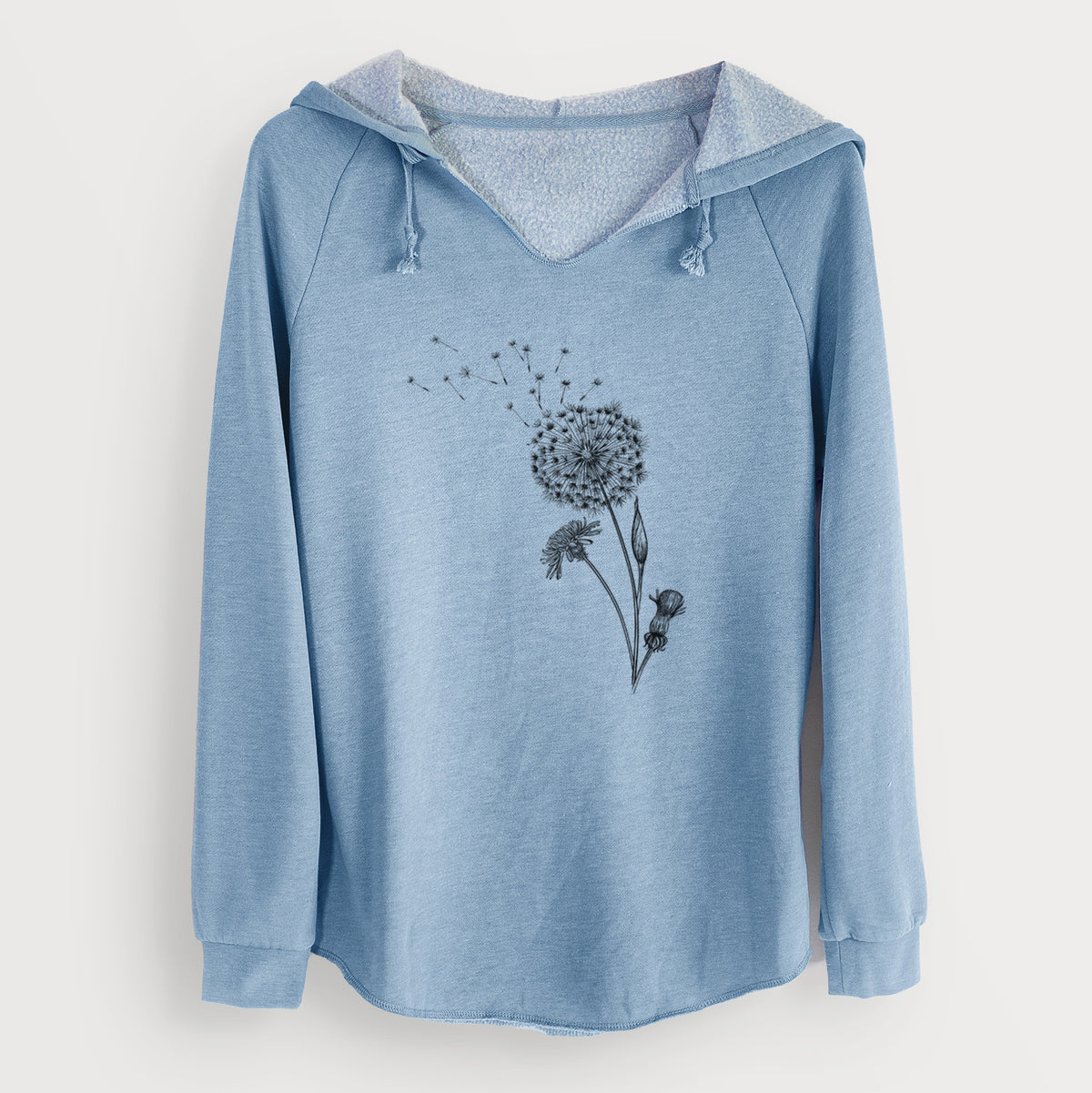 Misty blue women's Cali Wave hooded sweatshirt laid flat, printed with a black ink line drawing of a dandelion seed head with seeds blowing away.