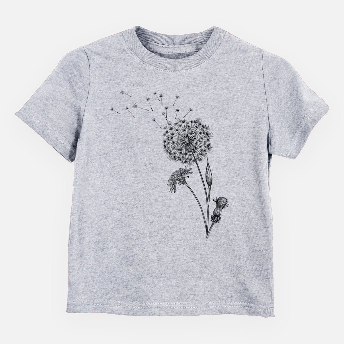Heather grey toddler t-shirt laid flat, printed with a black ink line drawing of a dandelion seed head with seeds blowing away.
