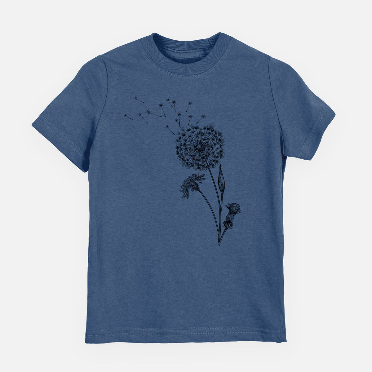 Indigo blue youth t-shirt laid flat, printed with a black ink line drawing of a dandelion seed head with seeds blowing away.