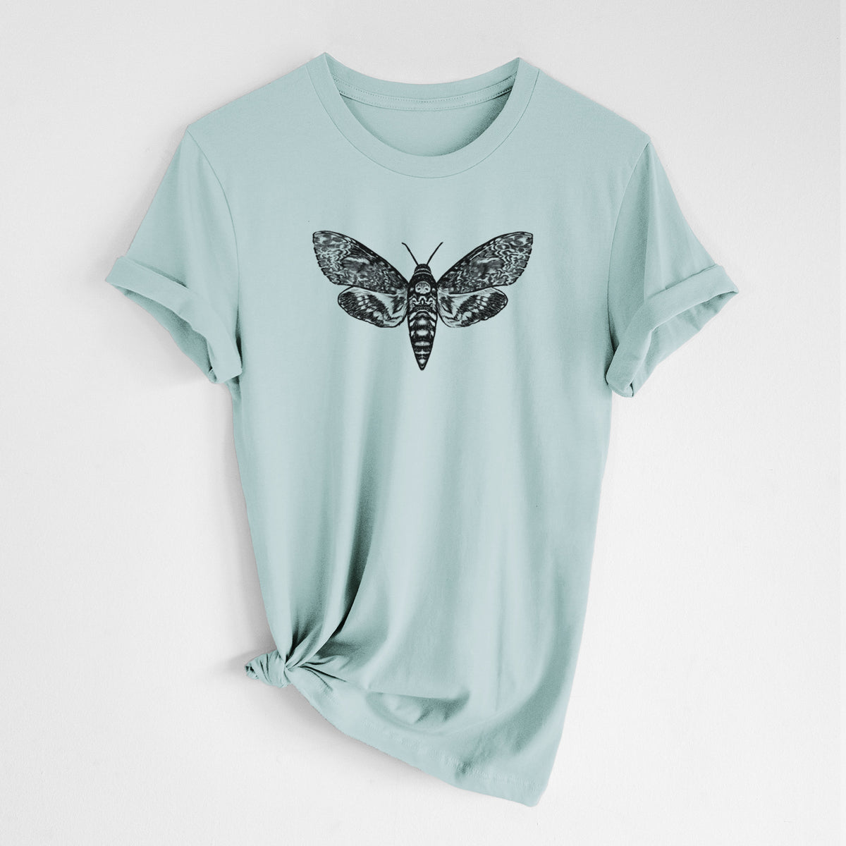 Dusty blue lightweight cotton t-shirt laid flat with the sleeves rolled, printed with a detailed black ink illustration of a death's-head hawkmoth with its wings spread.