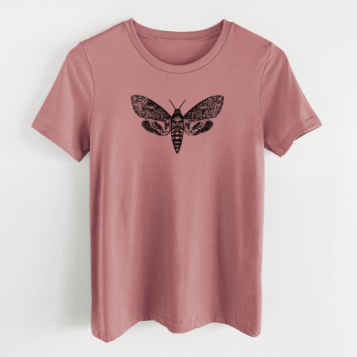 Mauve pink women's relaxed fit cotton t-shirt laid flat, printed with a detailed black ink illustration of a death's-head hawkmoth with its wings spread.