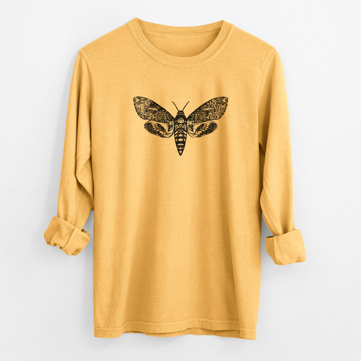 Golden wheat yellow Comfort Colors long sleeve shirt laid flat with the cuffs rolled, printed with a detailed black ink illustration of a death's-head hawkmoth with its wings spread.