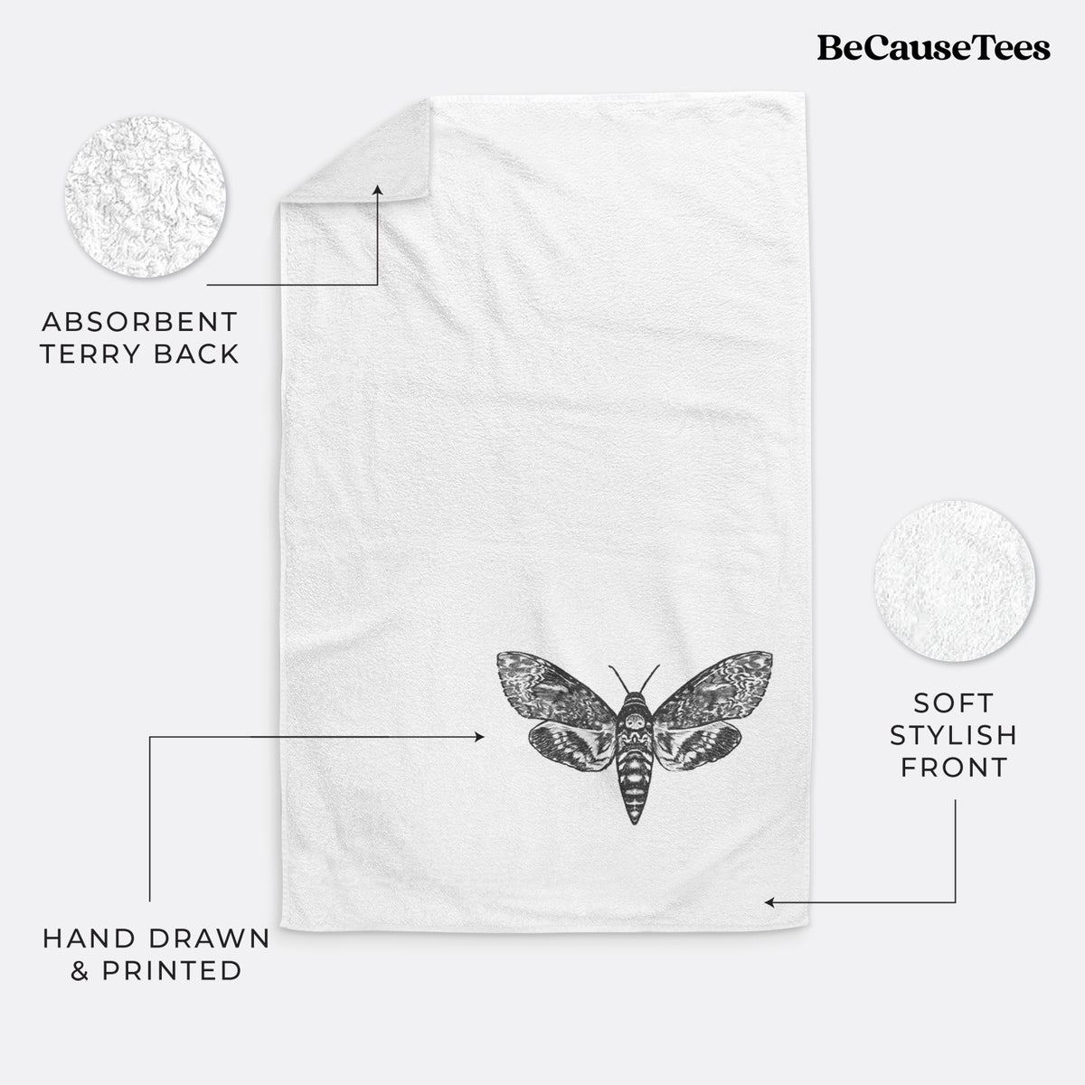 White hand towel printed with a detailed black ink illustration of a death's-head hawkmoth with its wings spread.