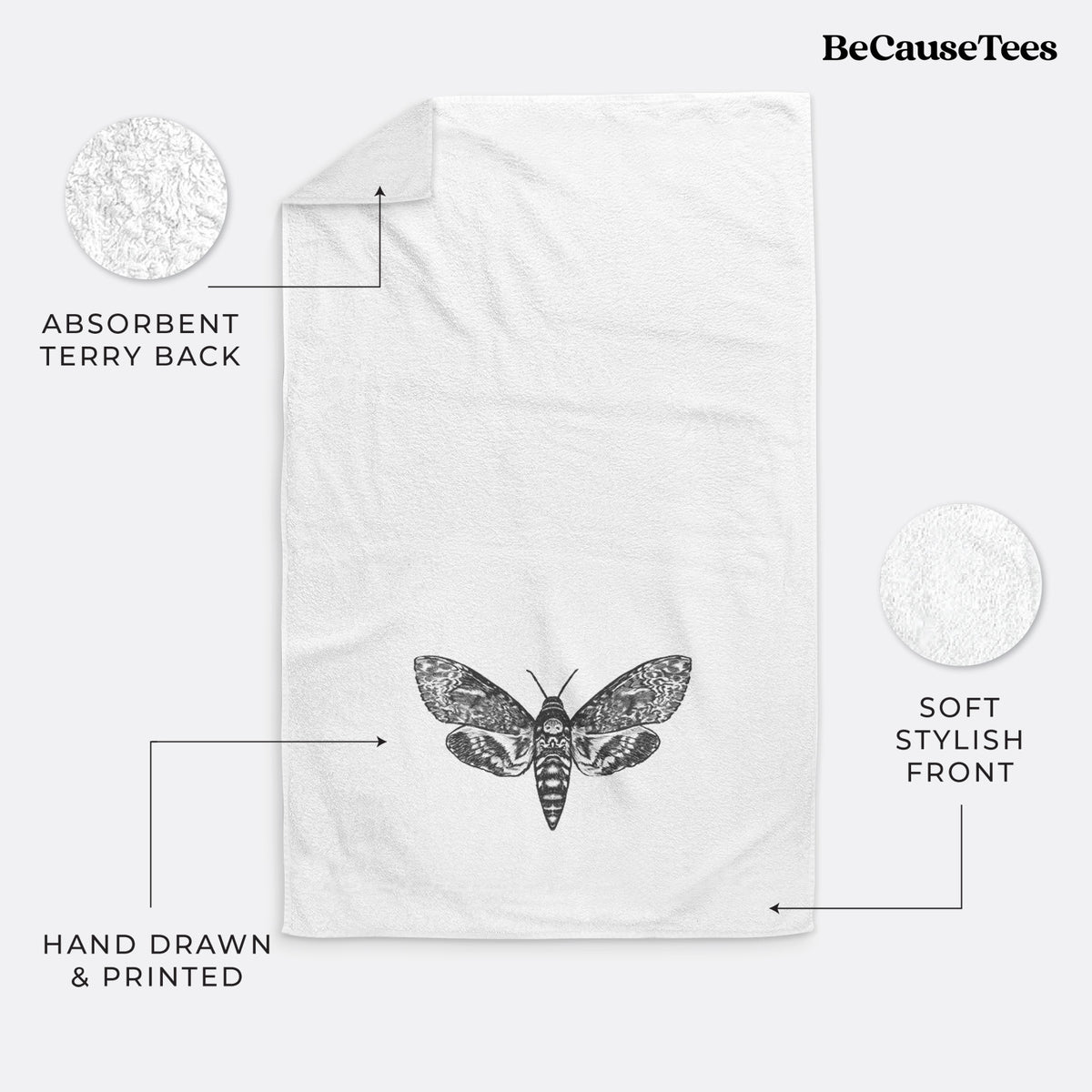 White hand towel printed with a detailed black ink illustration of a death's-head hawkmoth with its wings spread.