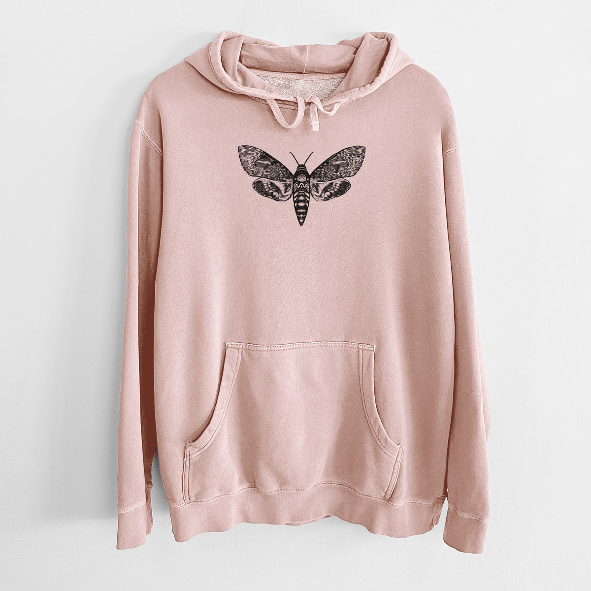 Dusty pink pigment dyed hoodie laid flat, printed with a detailed black ink illustration of a death's-head hawkmoth with its wings spread.