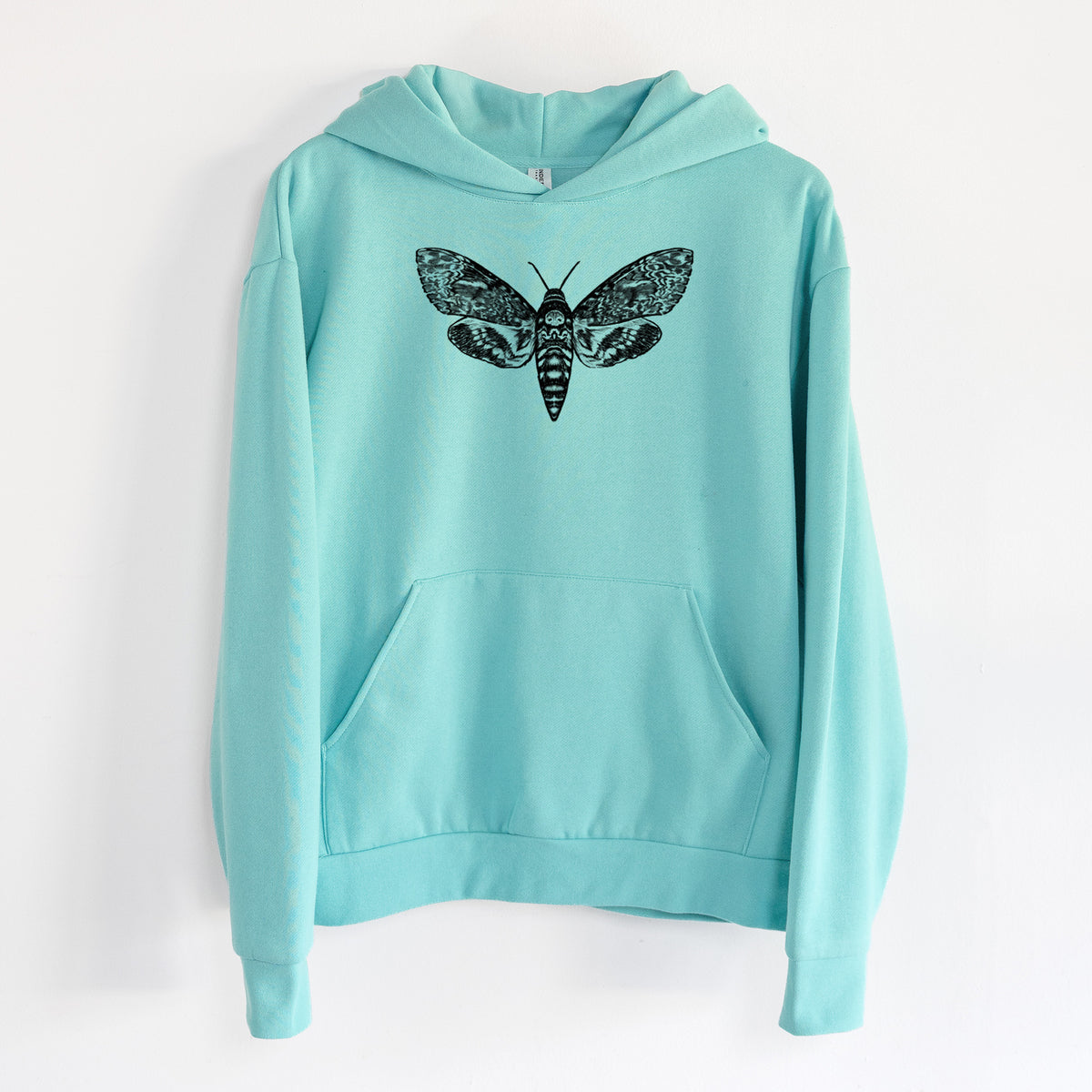 Death's-head Hawkmoth - Acherontia atropos - Statement Midweight Hoodie in Seafoam, hanging on a white wall, with a front kangaroo pocket and no drawcords.