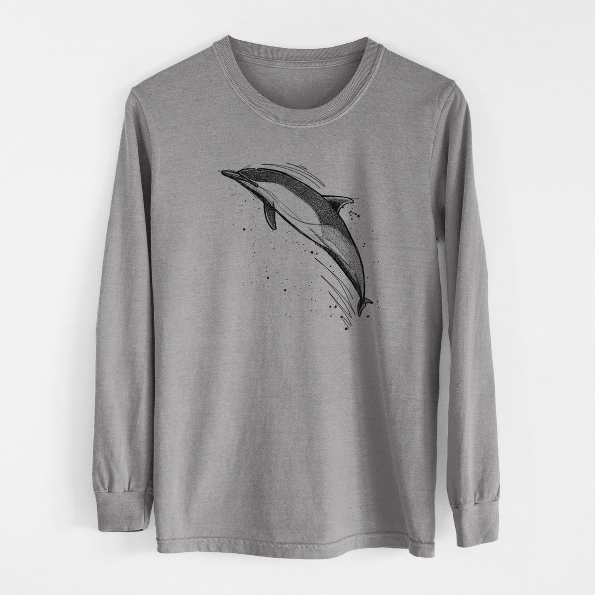 Grey Comfort Colors long sleeve shirt laid flat, printed with a black ink illustration of a common dolphin leaping, with ink splatters.