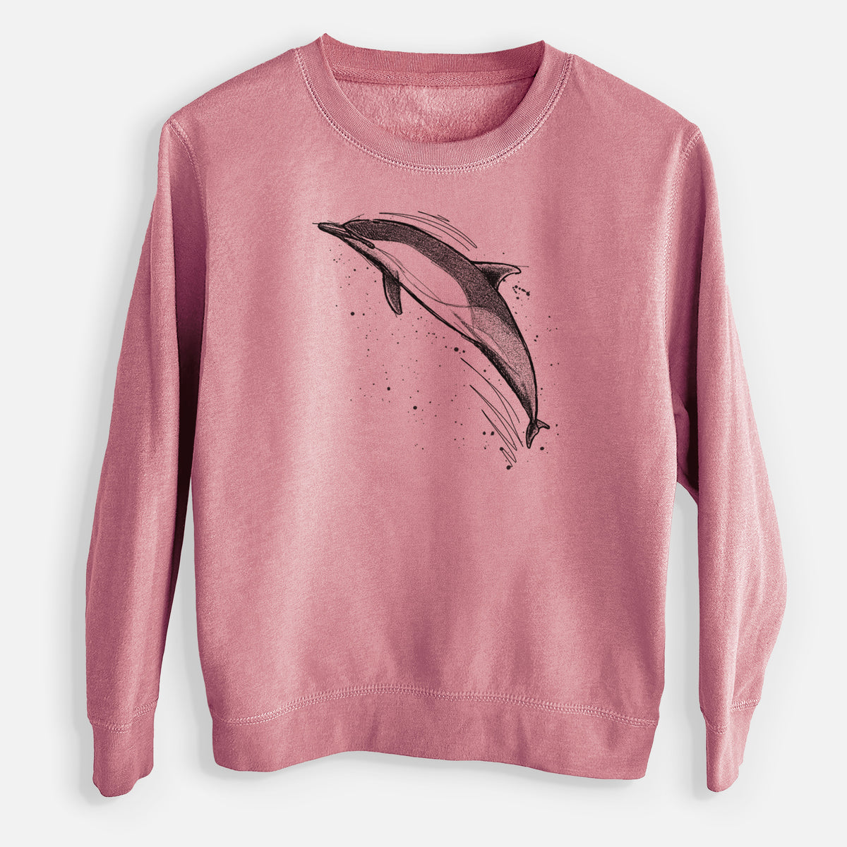 Mauve pink youth crewneck sweatshirt laid flat, printed with a black ink illustration of a common dolphin leaping, with ink splatters.