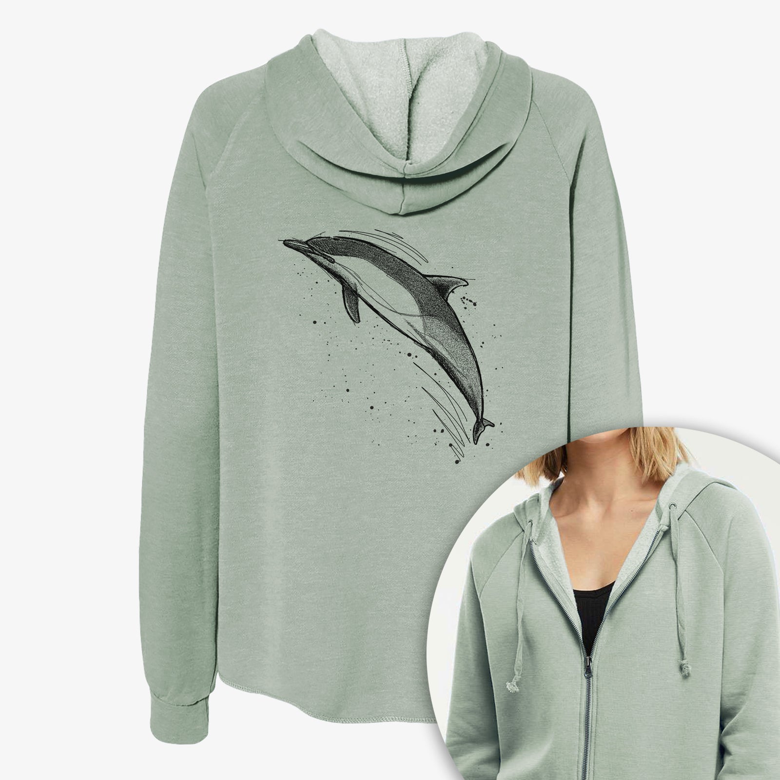 Women's Cali Wave zip-up sweatshirt printed with a black ink illustration of a common dolphin leaping, with ink splatters, with a close-up of the zipper.
