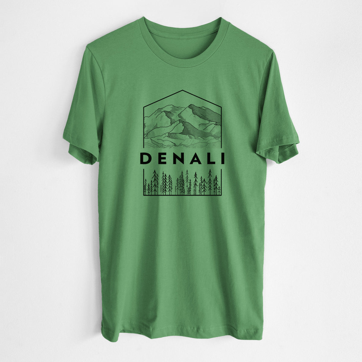 Leaf green lightweight cotton t-shirt laid flat, printed with a black line art badge of the Denali mountain range above pine trees, with the word Denali.