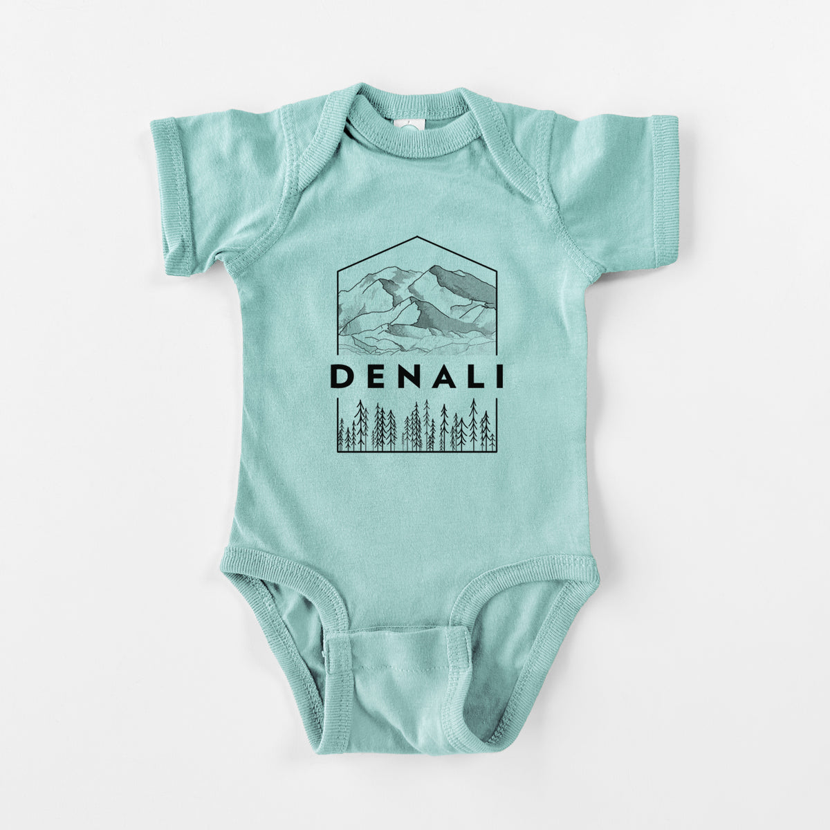 Saltwater baby bodysuit laid flat, printed with a black line art badge of the Denali mountain range above pine trees, with the word Denali.