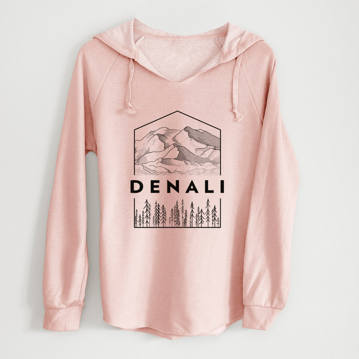 Blush pink women's Cali Wave hooded sweatshirt laid flat, printed with a black line art badge of the Denali mountain range above pine trees, with the word Denali.