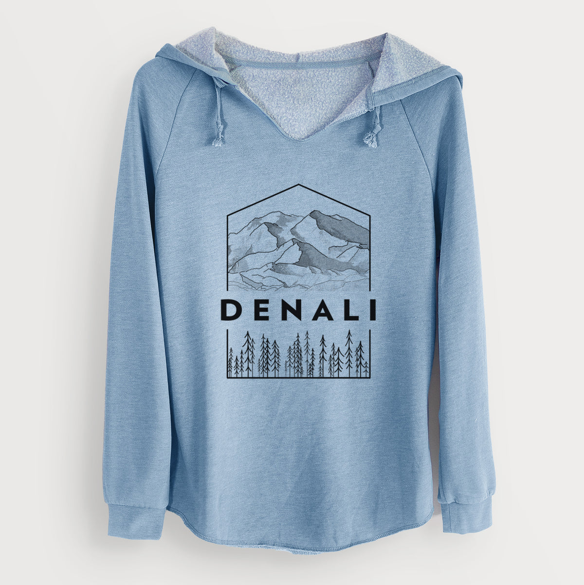 Misty blue women's Cali Wave hooded sweatshirt laid flat, printed with a black line art badge of the Denali mountain range above pine trees, with the word Denali.