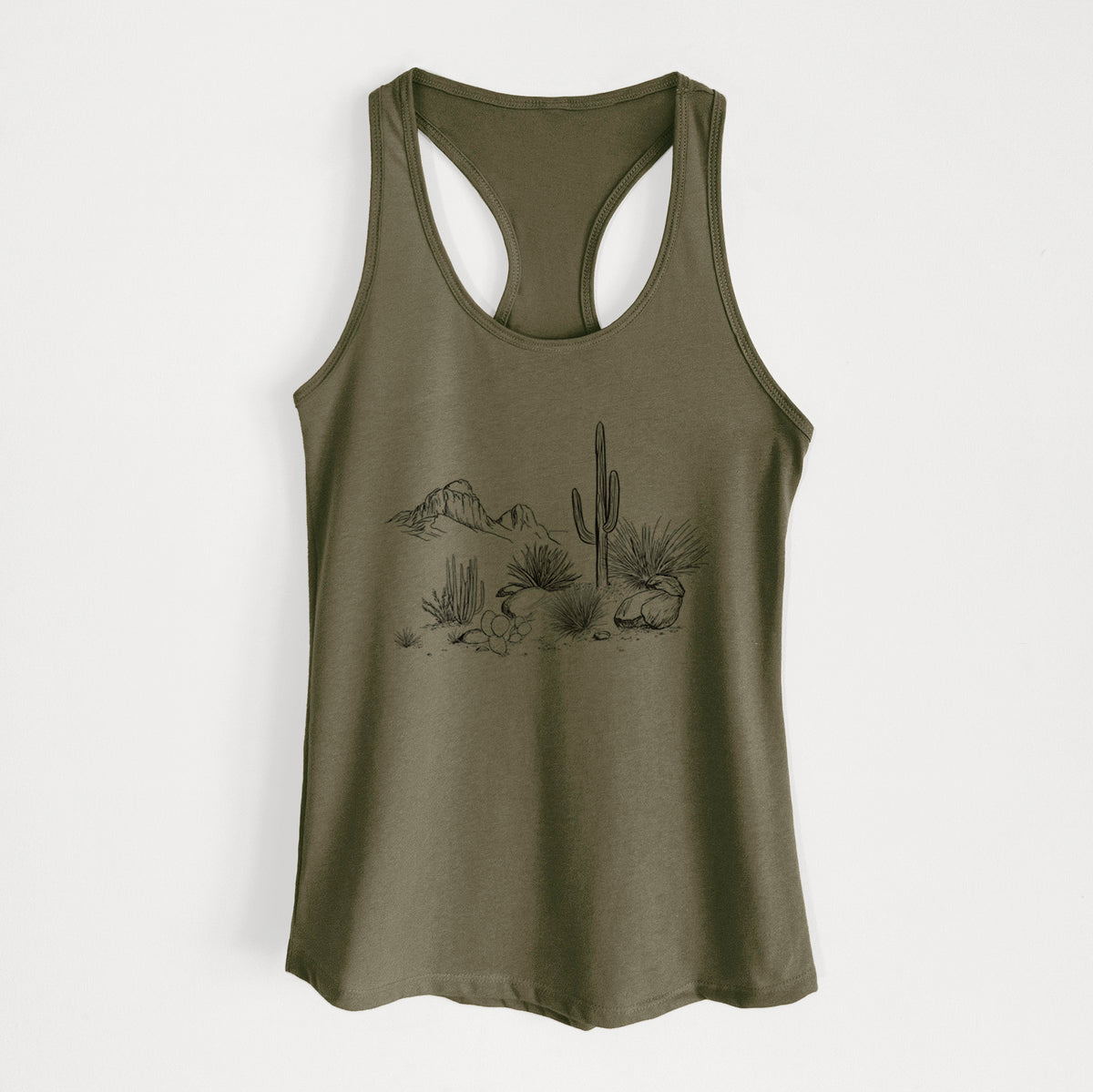 Military green women's racerback tank top laid flat, printed with a black ink desert scene with a saguaro cactus, agave, rocks and distant mountains.