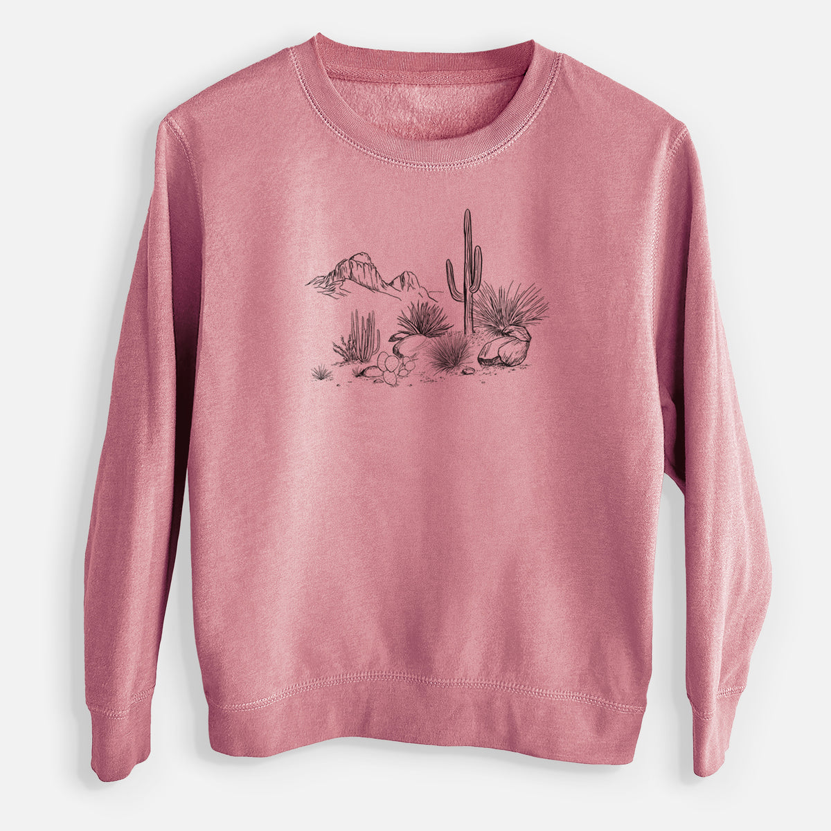 Mauve pink youth crewneck sweatshirt laid flat, printed with a black ink desert scene with a saguaro cactus, agave, rocks and distant mountains.
