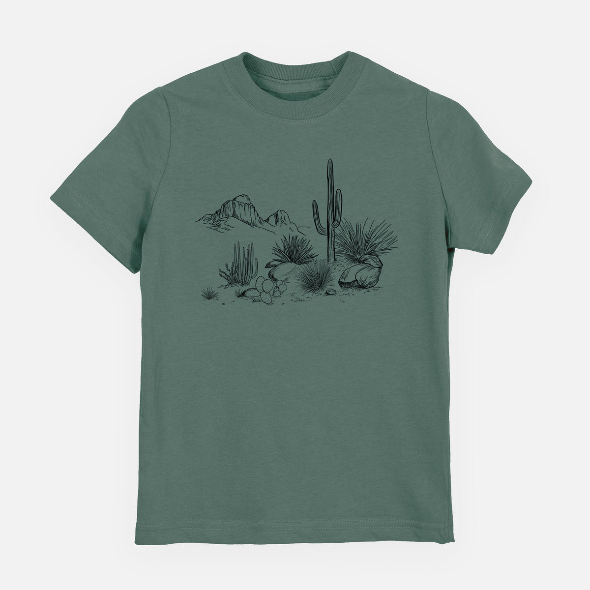 Basil green youth t-shirt laid flat, printed with a black ink desert scene with a saguaro cactus, agave, rocks and distant mountains.