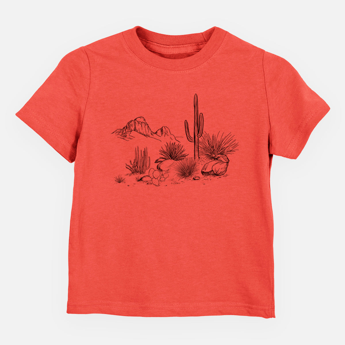 Passionfruit pink toddler t-shirt laid flat, printed with a black ink desert scene with a saguaro cactus, agave, rocks and distant mountains.