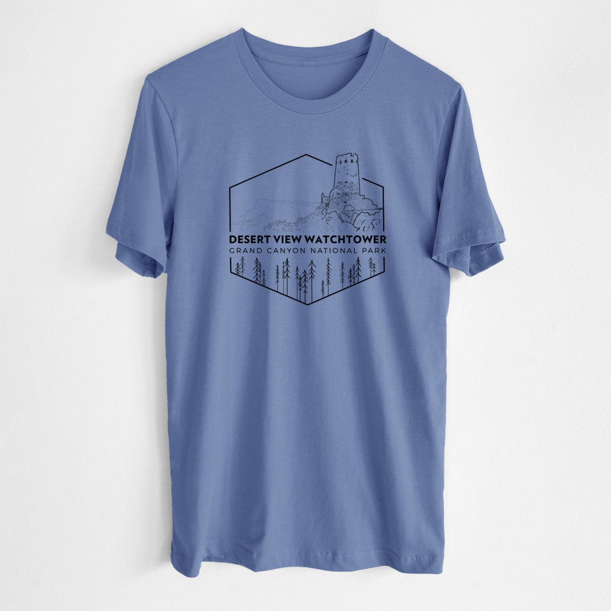 Blue bell lightweight cotton t-shirt laid flat, printed with a black line art badge of the Desert View Watchtower above pine trees, with the words Desert View Watchtower, Grand Canyon National Park.