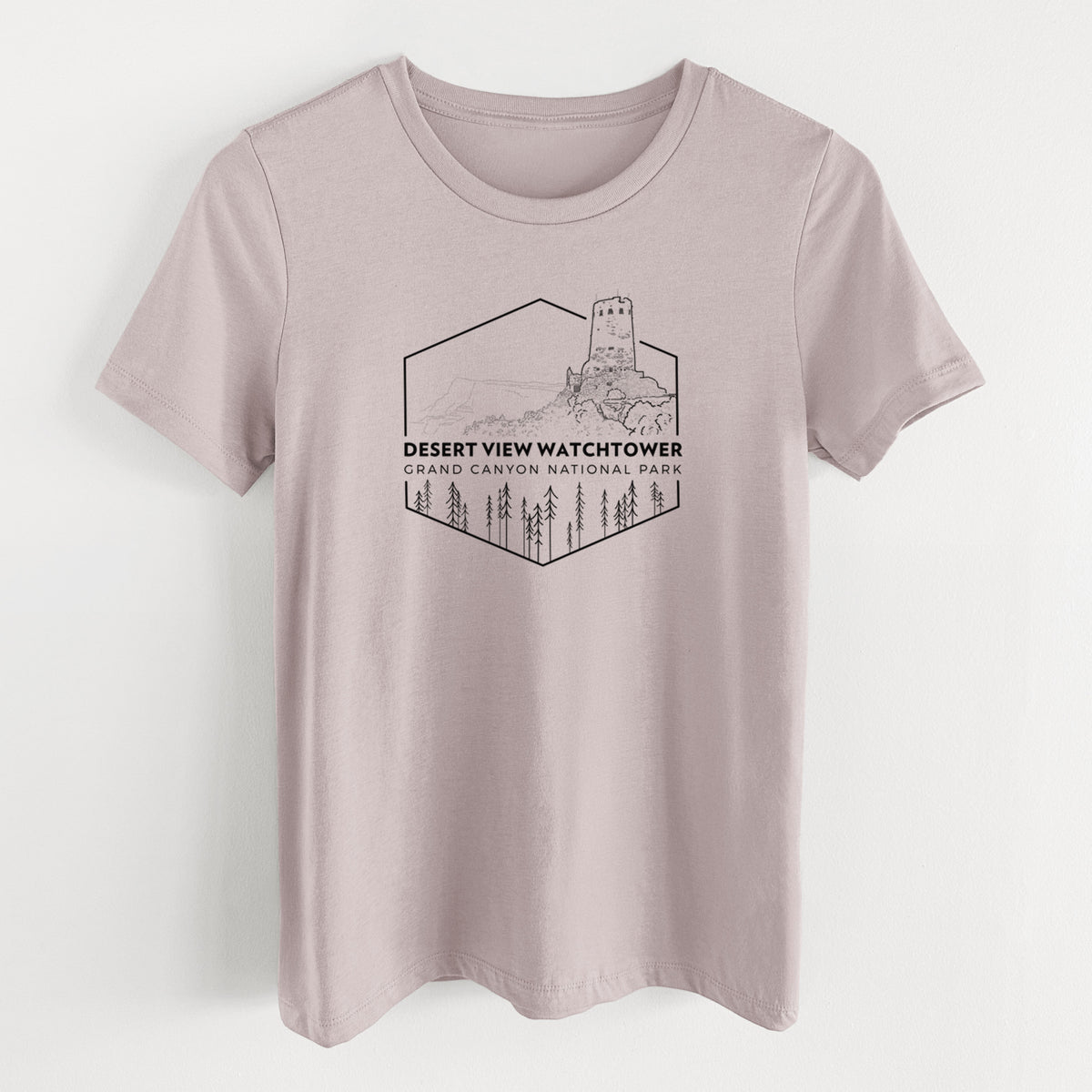 Pink gravel women's relaxed fit cotton t-shirt laid flat, printed with a black line art badge of the Desert View Watchtower above pine trees, with the words Desert View Watchtower, Grand Canyon National Park.