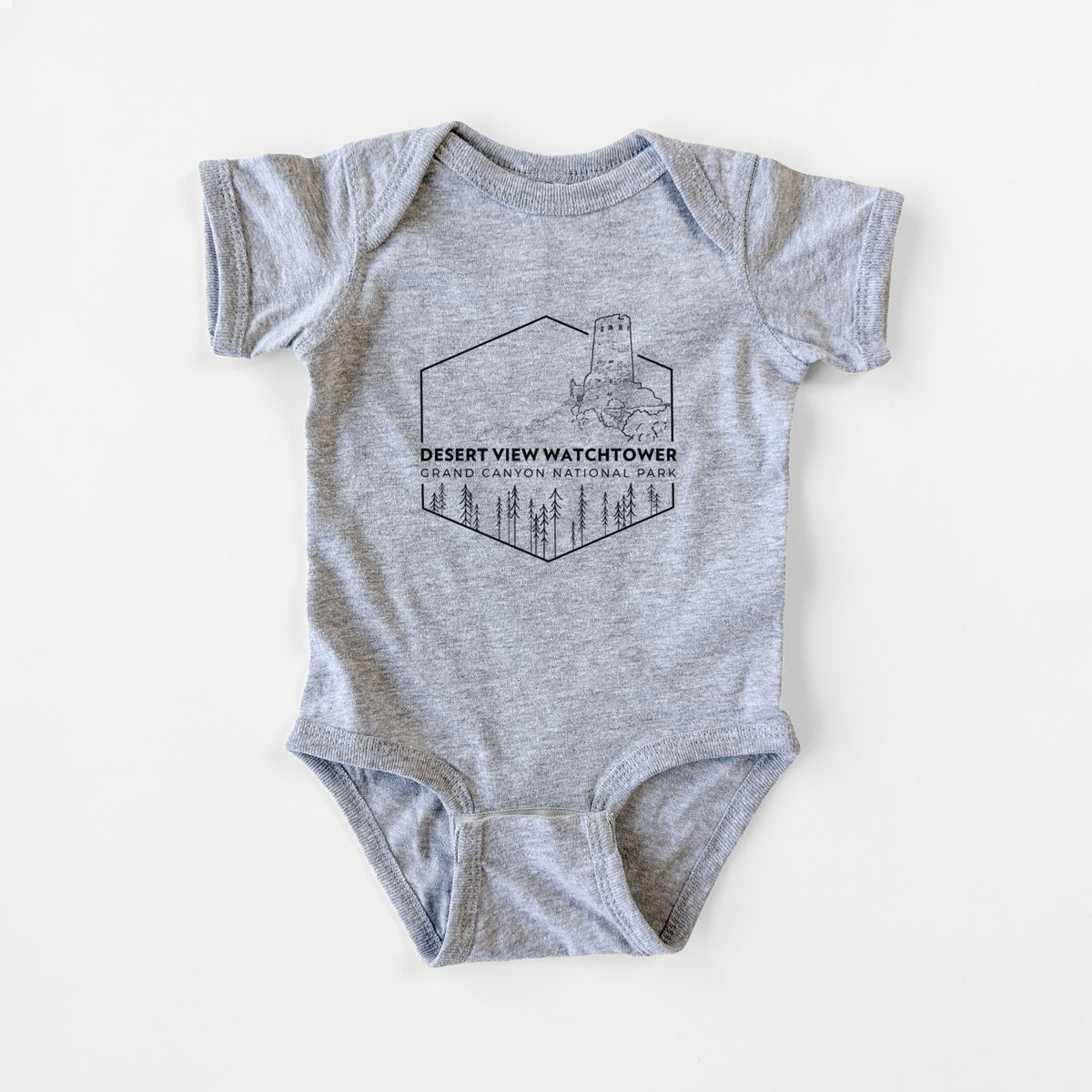 Grey baby bodysuit laid flat, printed with a black line art badge of the Desert View Watchtower above pine trees, with the words Desert View Watchtower, Grand Canyon National Park.