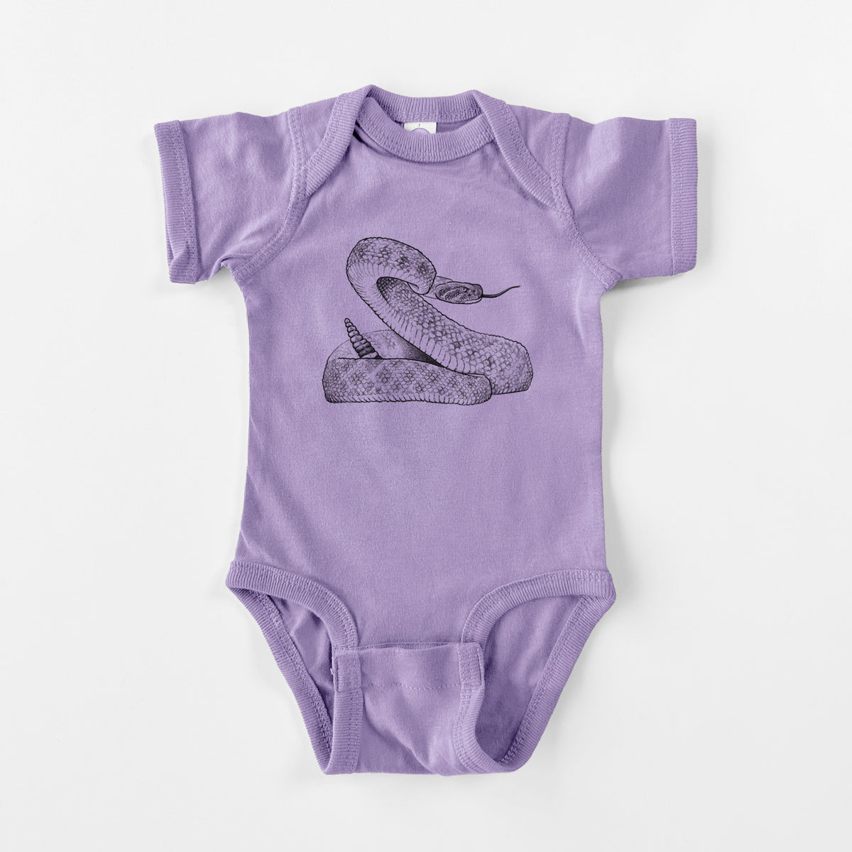 Lavender baby bodysuit laid flat, printed with a detailed black ink illustration of a coiled diamondback rattlesnake.