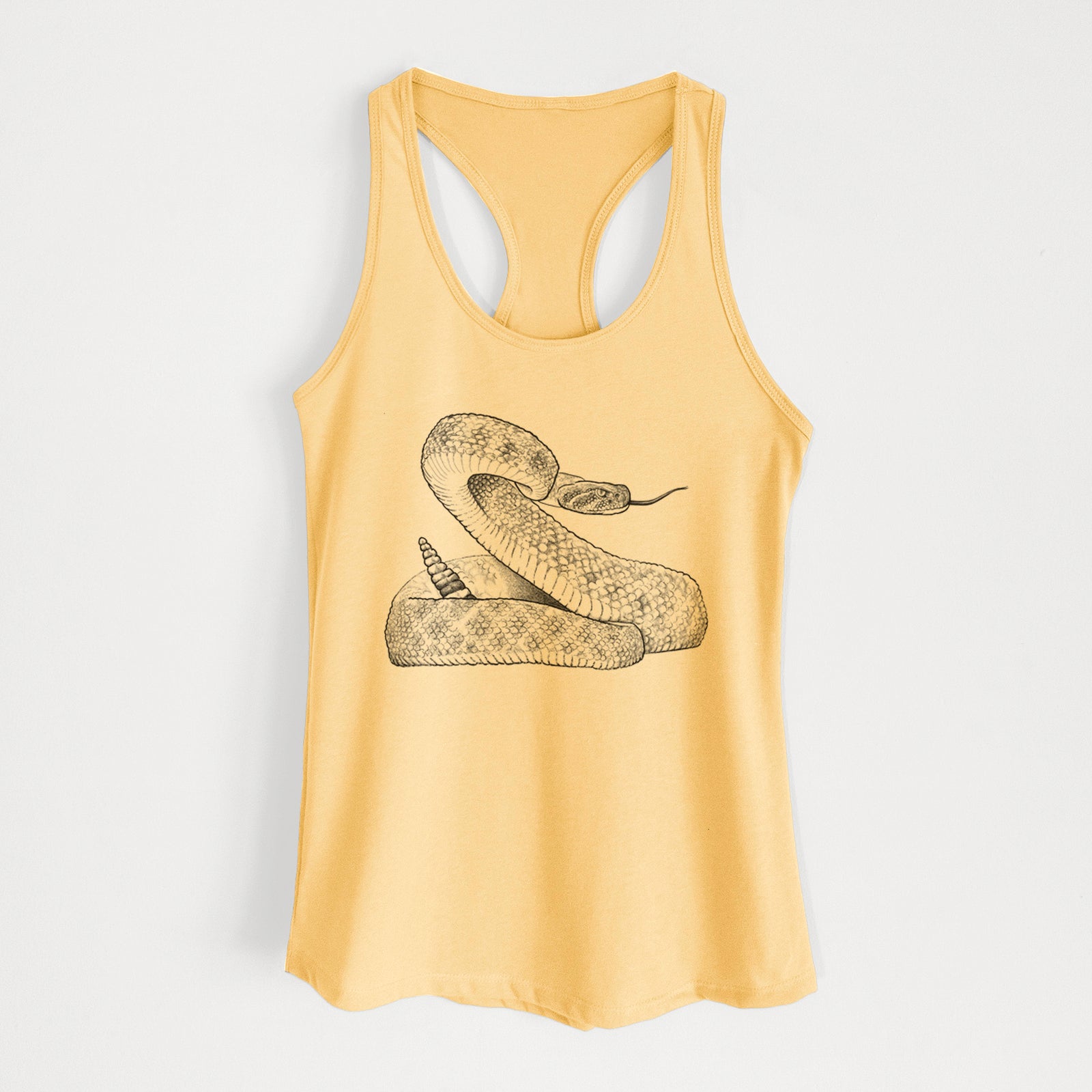 Banana cream women's racerback tank top laid flat, printed with a detailed black ink illustration of a coiled diamondback rattlesnake.