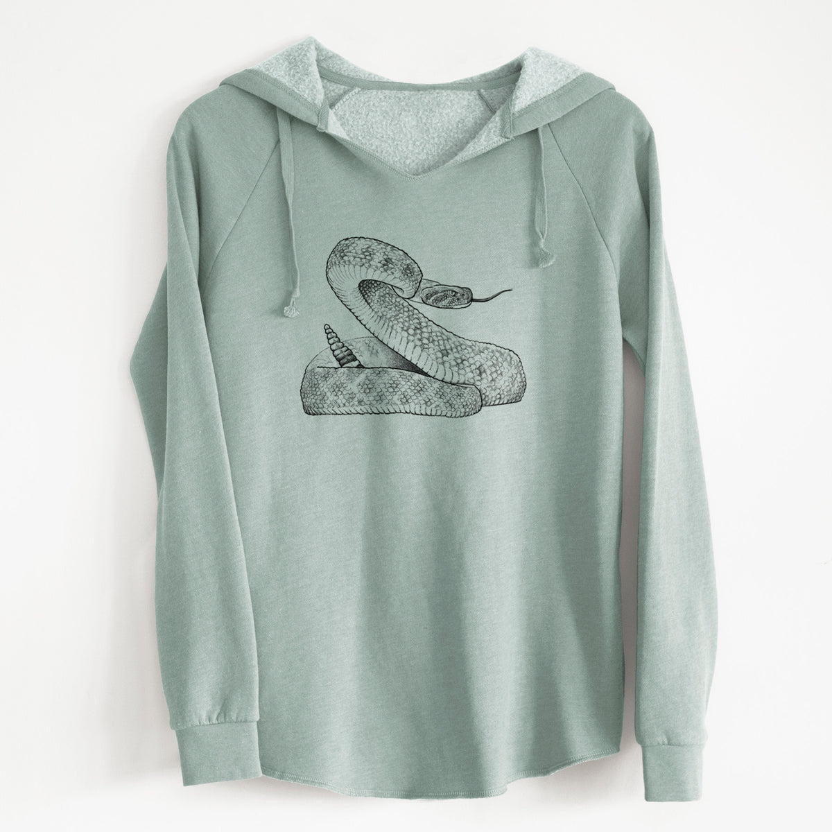 Sage green women's Cali Wave hooded sweatshirt laid flat, printed with a detailed black ink illustration of a coiled diamondback rattlesnake.