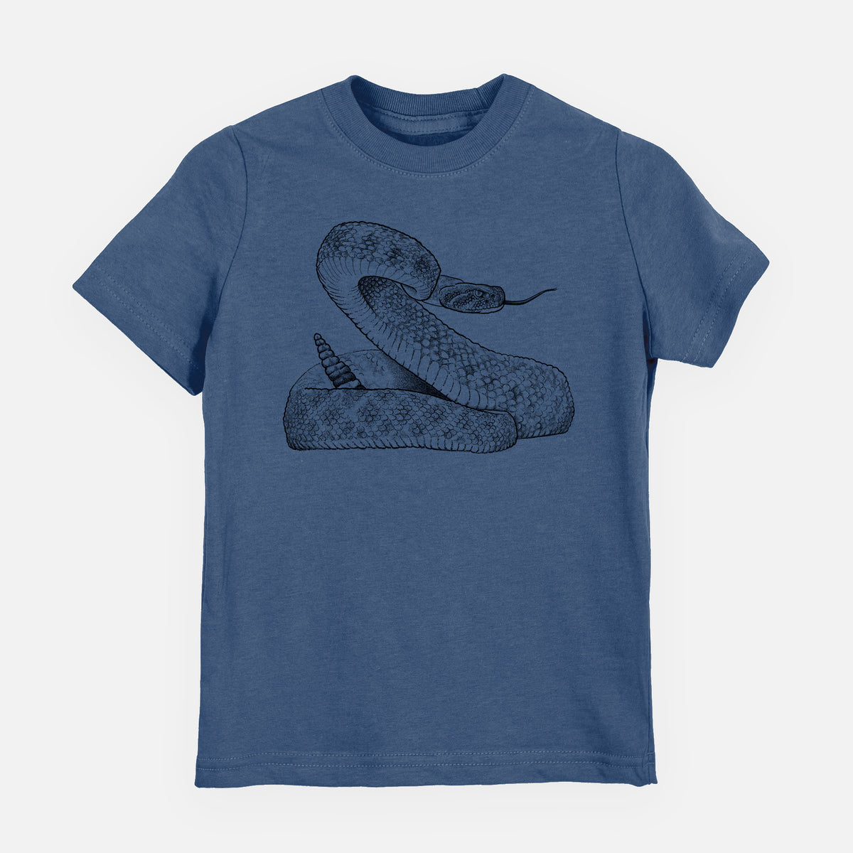 Indigo blue youth t-shirt laid flat, printed with a detailed black ink illustration of a coiled diamondback rattlesnake.