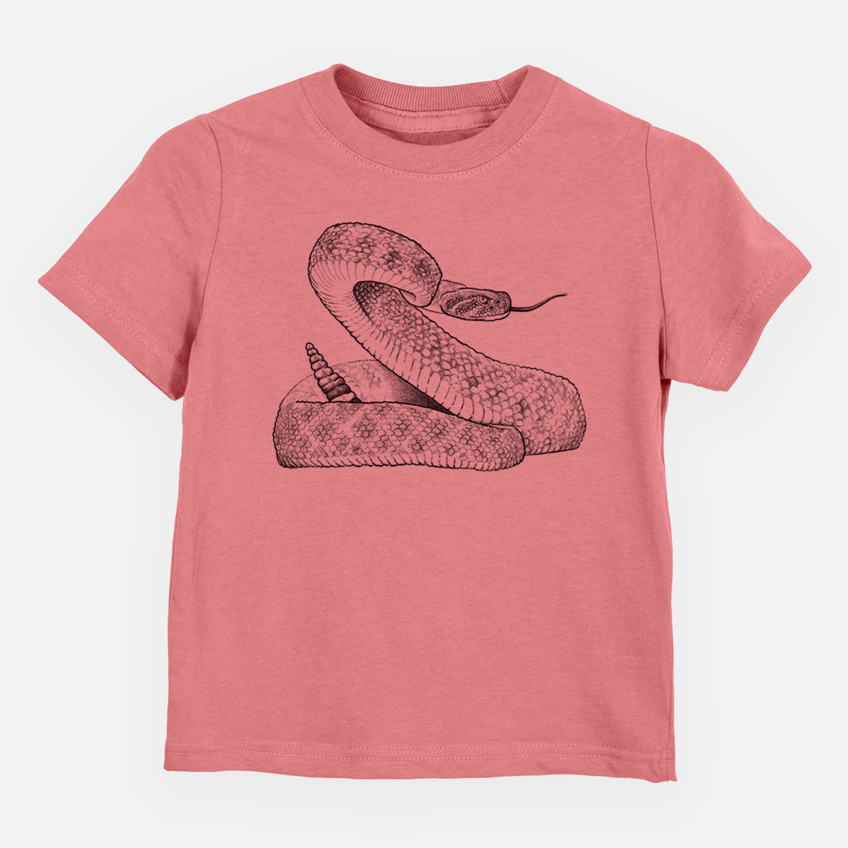 Mauve pink toddler t-shirt laid flat, printed with a detailed black ink illustration of a coiled diamondback rattlesnake.
